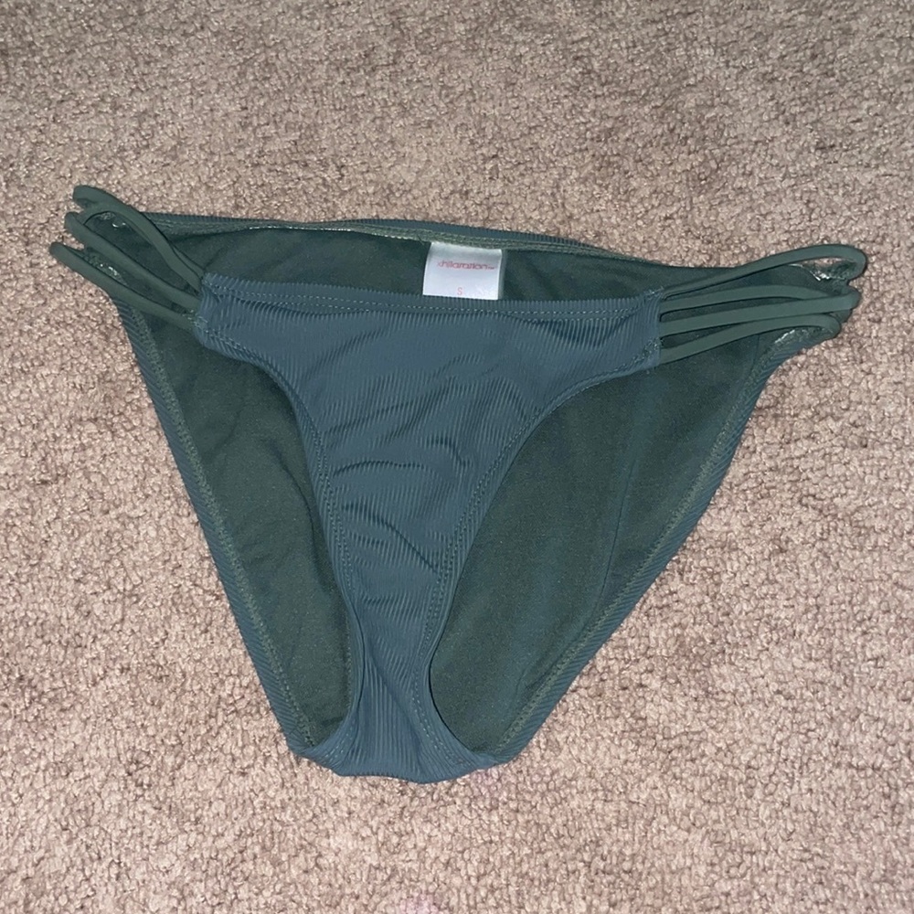Green target swimsuit bottoms